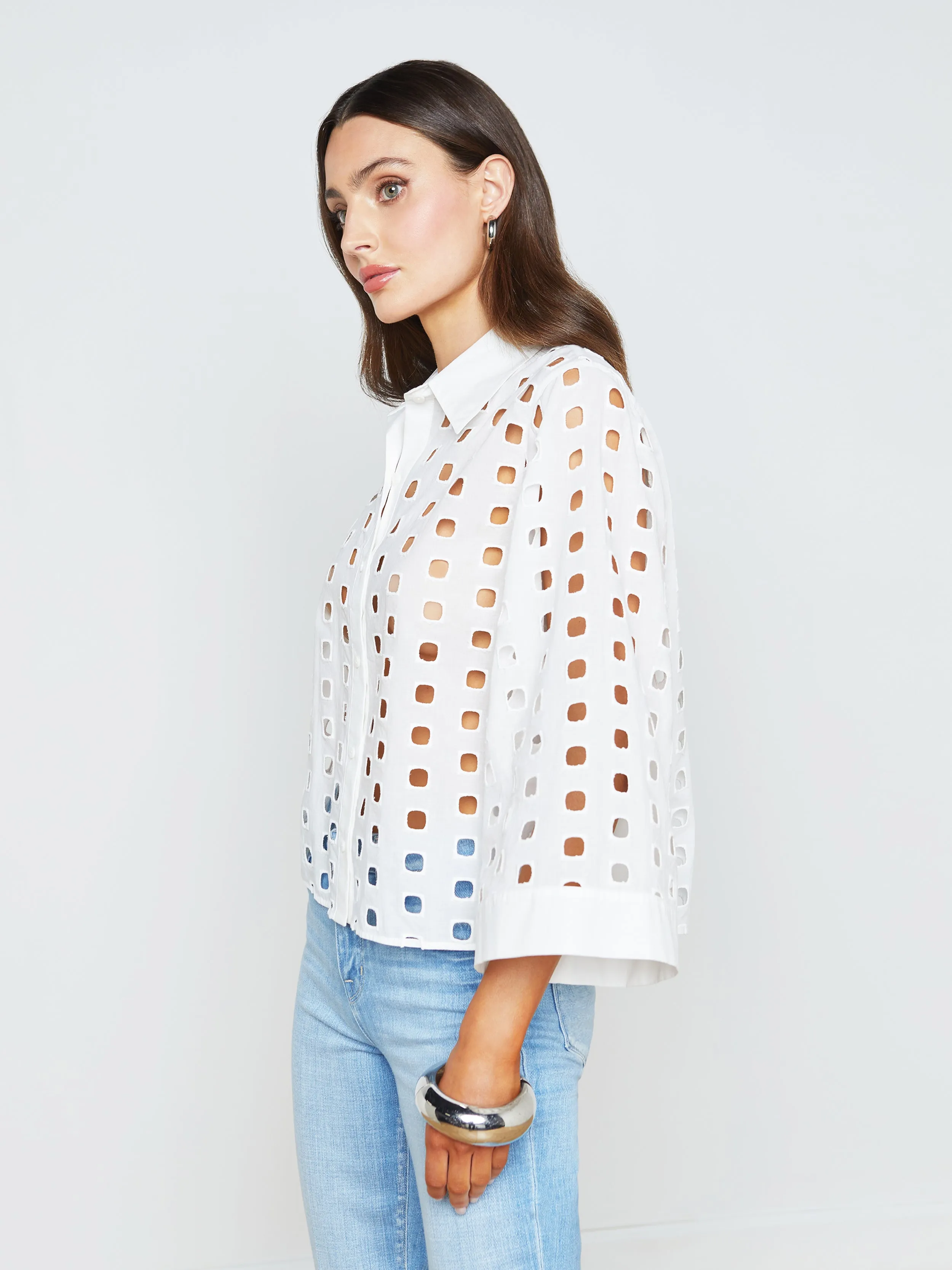 Sure! Here’s an optimized title for the product:

Elegant Breslin Eyelet Blouse with Delicate Lace Detail – Perfect for Every Occasion