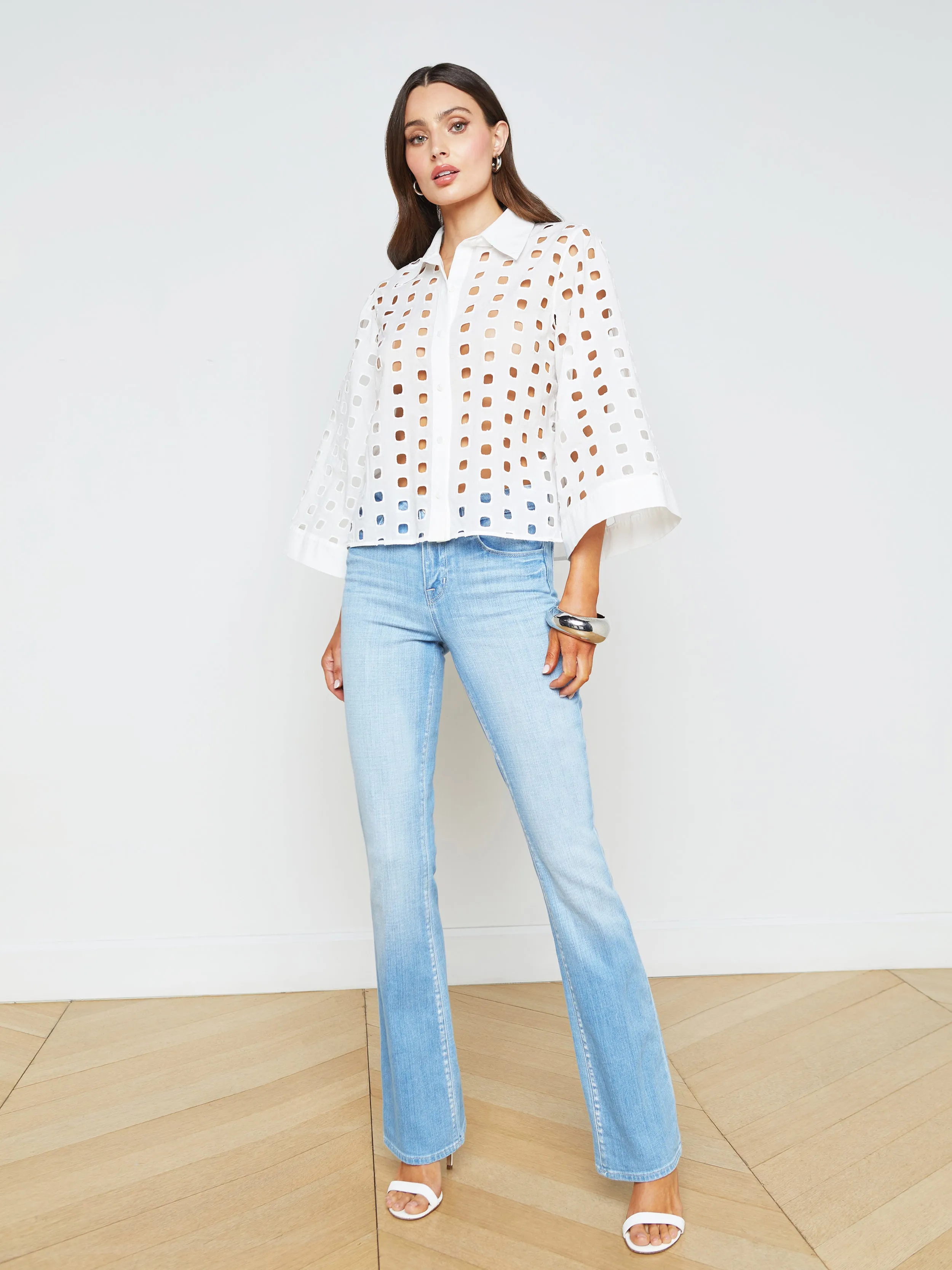 Sure! Here’s an optimized title for the product:

Elegant Breslin Eyelet Blouse with Delicate Lace Detail – Perfect for Every Occasion